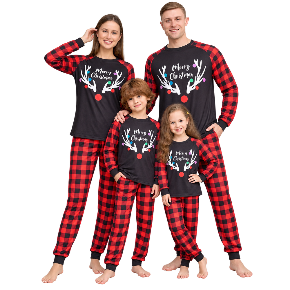 A family of four wearing matching Christmas pajamas with a black top featuring a white reindeer antler graphic and 'Merry Christmas' text, paired with red and black buffalo plaid pajama pants, on a solid white background.