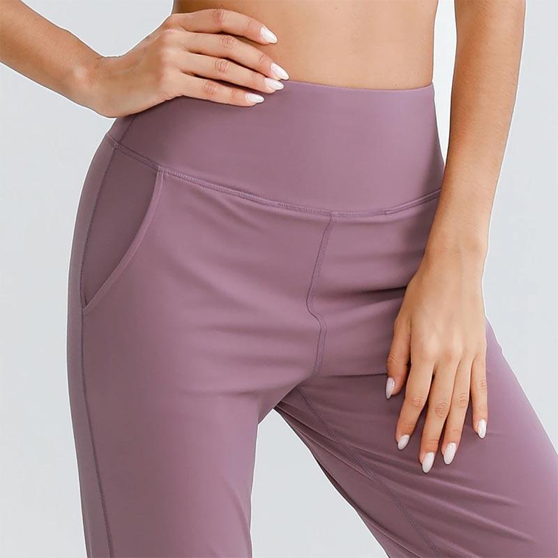 Women's High-Waist Loose Joggers with Pockets - model wearing