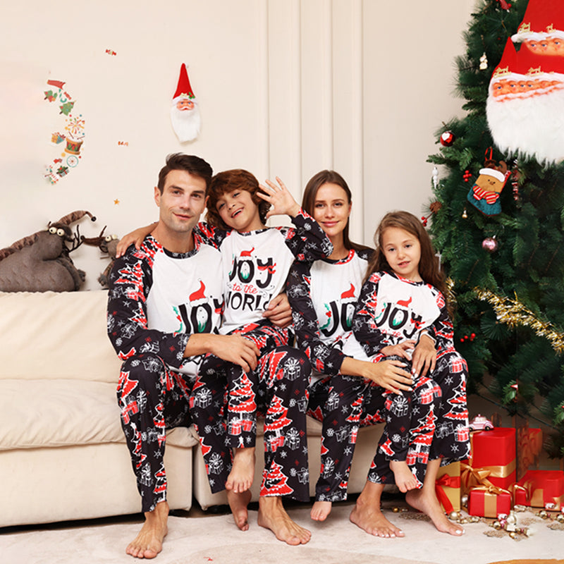 Family Joy World Christmas Matching Pajamas - model wearing