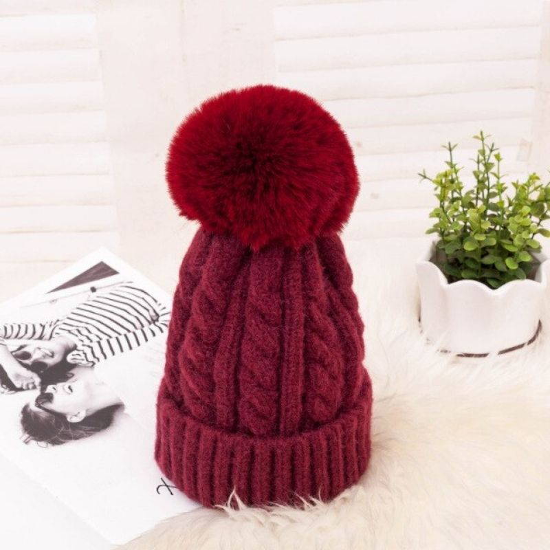 Women's Braided Beanie with Removable Pom-Pom - model wearing